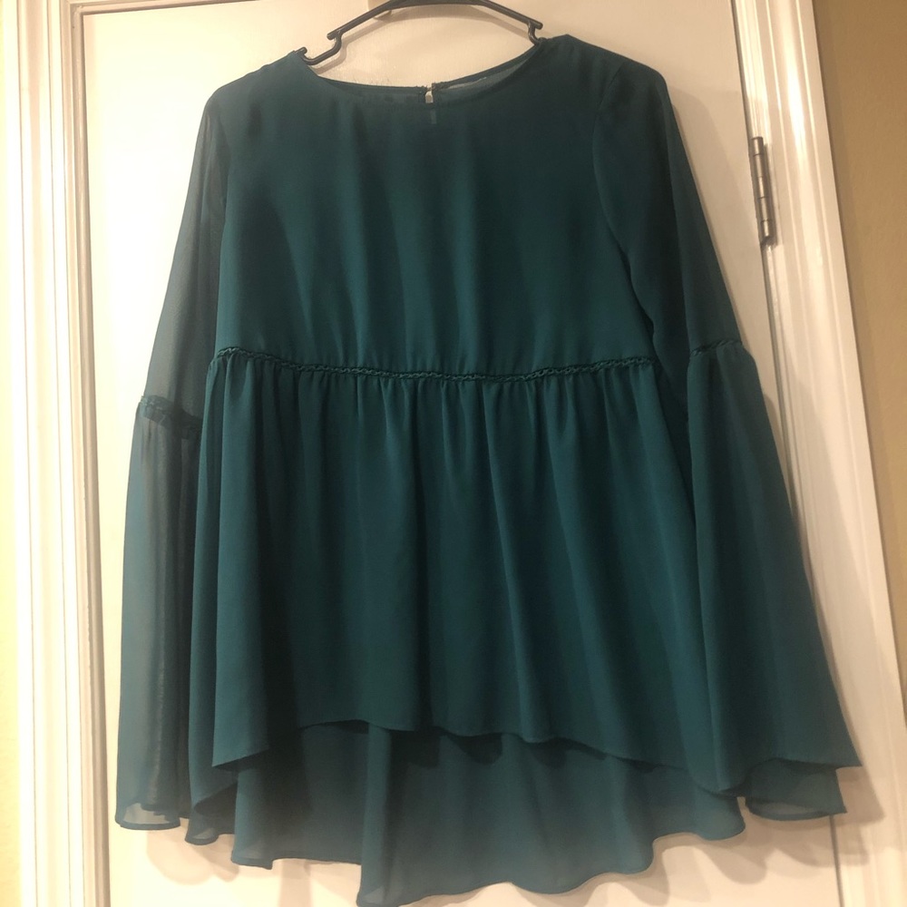 flowy green blouse